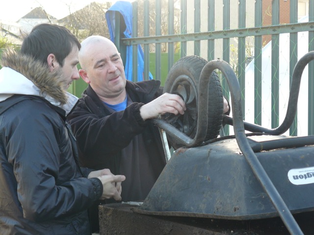 Kenny fixing wheelbarrow